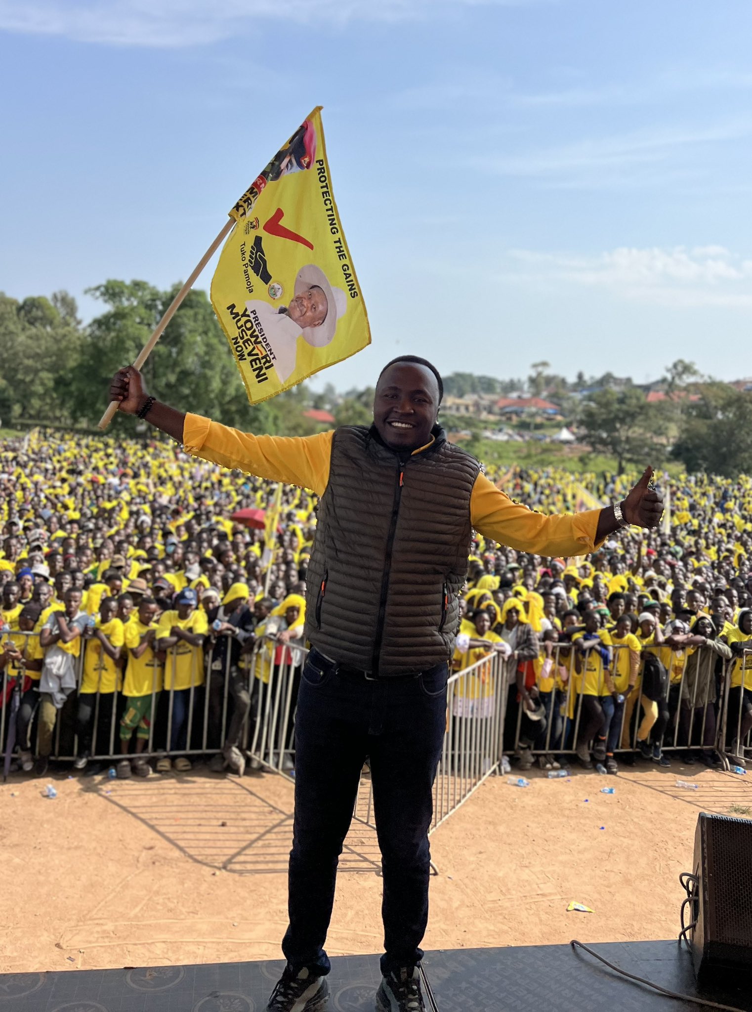 Moses Gumisiriza before a mammoth gathering during Museveni's campaigns. He was usually an emcee at such gatherings all-over Uganda 