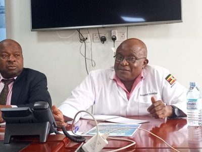 Salim Kiveijinja (L) and Dr. Robert Ssentongo (R) during a press briefing in Kayunga